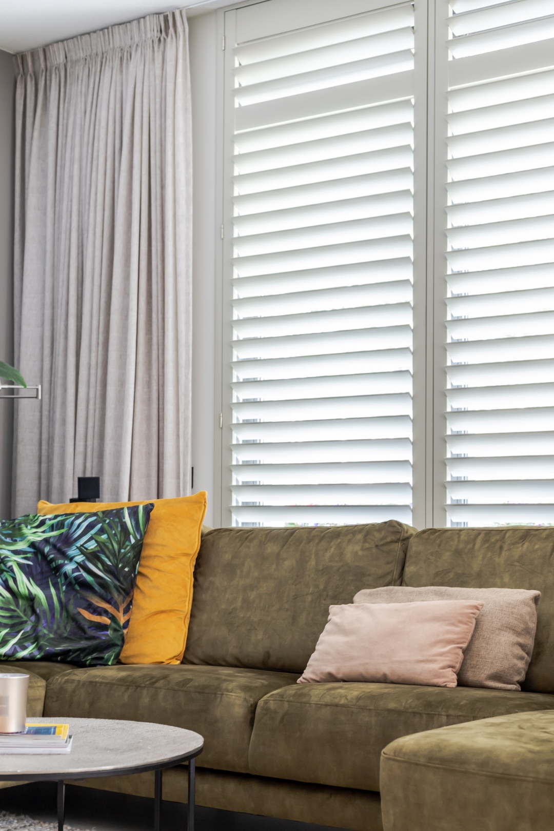 Plantation shutters with curtains